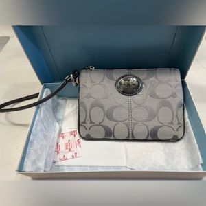 Coach wristlet grey, new with box, no tags